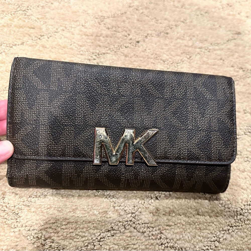Michael Kors MK Monogrammed wallet.